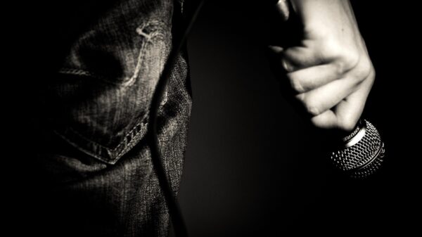 holding a microphone