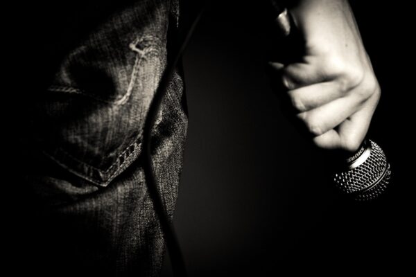 holding a microphone