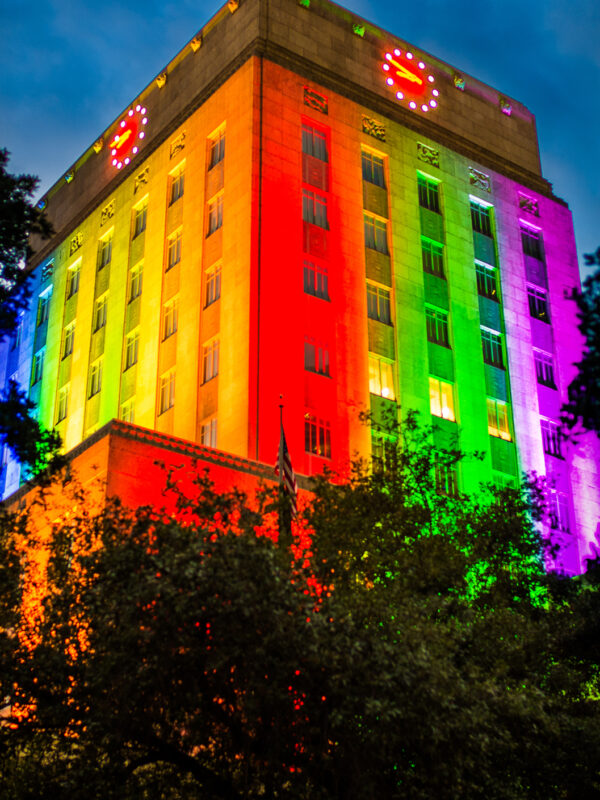 Houston City Hall lit up with rainbow colors