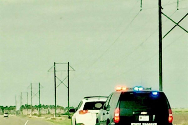 border patrol officer pulling over vehicle