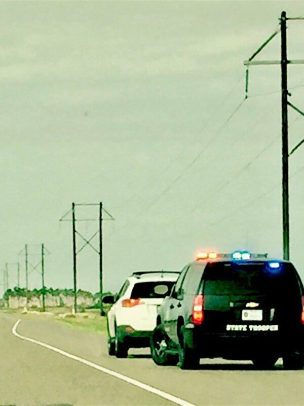 border patrol officer pulling over vehicle