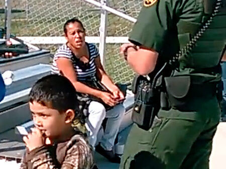 Border patrol with mother and son at La Joya baseball game