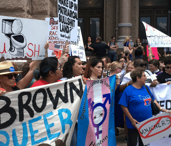 protestors rally against a special session