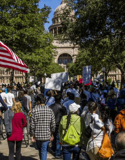 students rally against SB4 at the Texas capitol