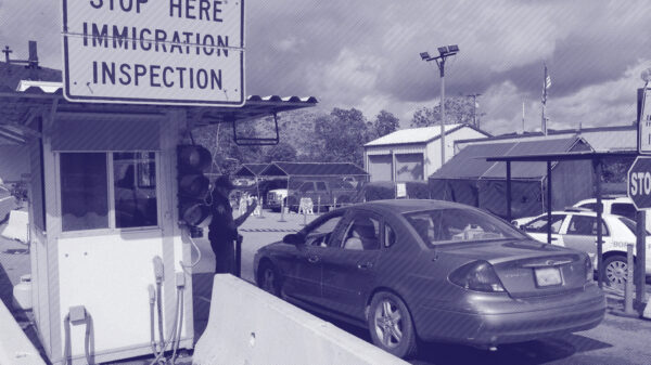 A care arrives at an immigration checkpoint within the 100-mile zone