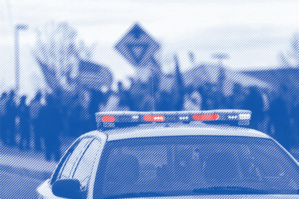 Police car with lights on roof highlighted