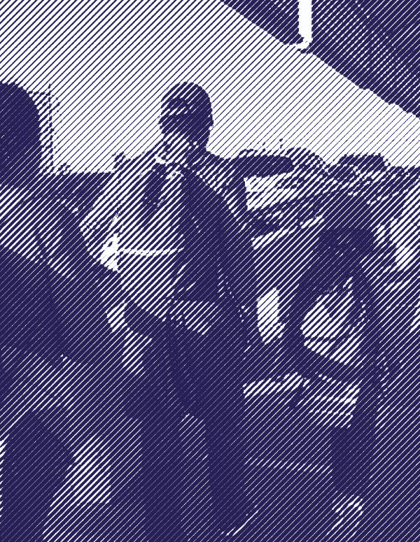 Image: A stylized photo shows a family, their backs to the camera, carrying backpacks and walking along the international bridge between Matamoros in Mexico and Brownsville, TX. 