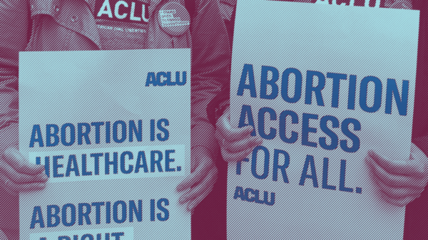 Image:  A stylized photo shows two people from the neck down. They wear ACLU t-shirts and hold signs. One reads: "Abortion is healthcare. Abortion is a right." The other says, "Abortion access for all."