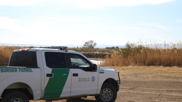 Photograph of a Customs and Border Protection truck parked on the side of the road