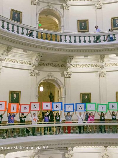 Photo: Representatives of the Trust, Respect, Access Coalition, holding multicolored signs spelling out ABORTION=HEALTHCARE, gathered in the Texas Capitol Rotunda Thursday afternoon July 27, 2017 to voice their opposition to abortion legislation being...