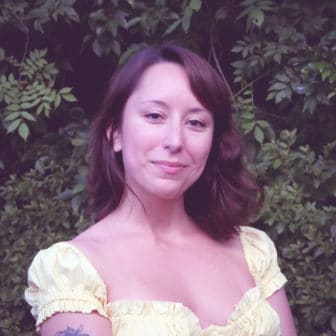 Photo: Alyssa Ramos poses in front of foliage outside