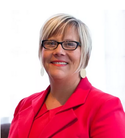 Photo: Amy Hagstrom Miller poses for a photo in front of a solid background