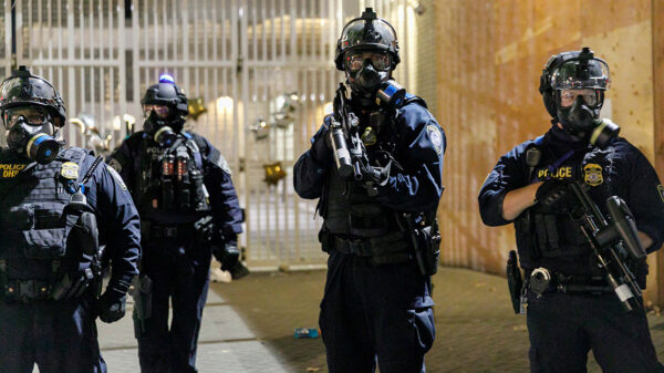 Demonstrators clashed with Federal and Portland police at an Immigration and Customs Enforcement facility after a march in solidarity with ICE detainees