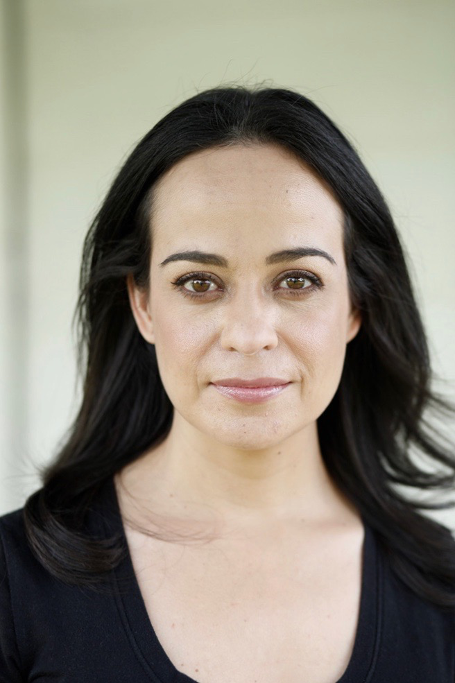 Photo: Cecilia Balli poses for a photo outdoors.