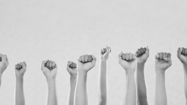 Image of raised fists