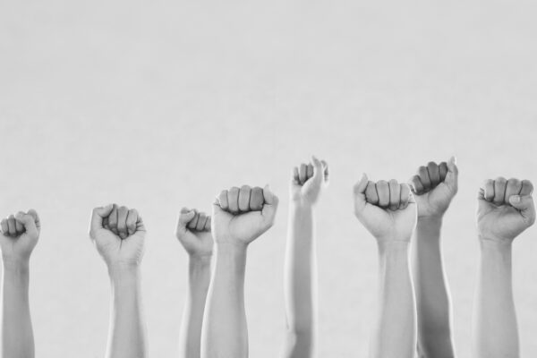 Image of raised fists