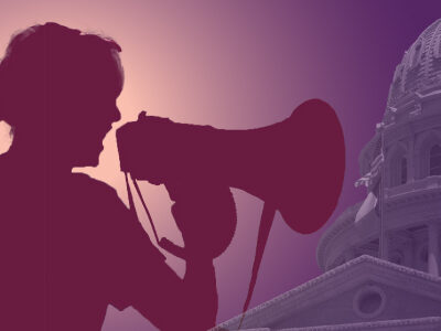 A silhouette of a person with a bullhorn in front of the Texas Capitol