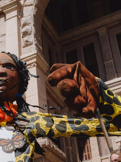 Giant puppets rally for immigrants' rights against Texas anti-immigrant law SB4