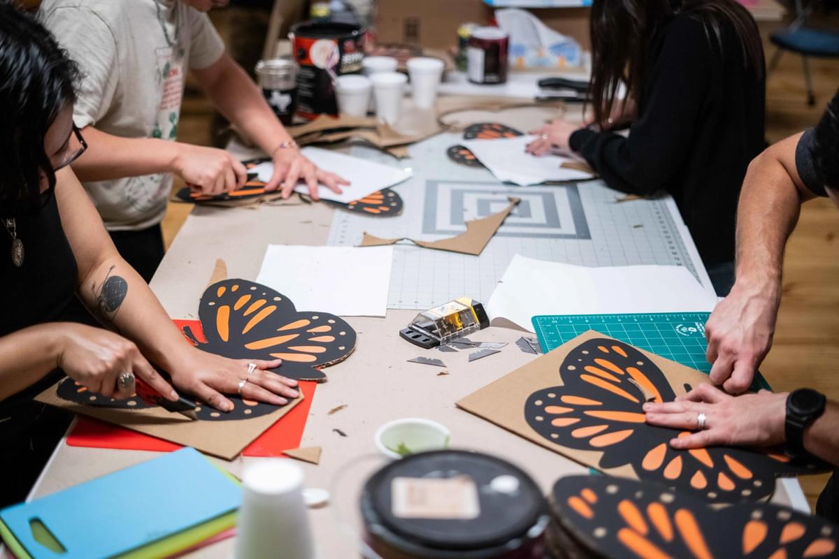 Volunteers making art for the rally for immigrants' rights