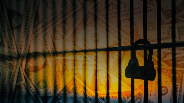 jail bars across a background of money