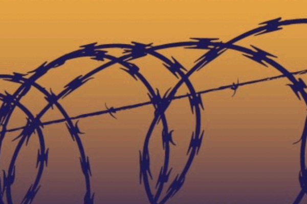 barb wire over a yellow background