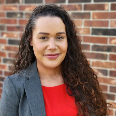Image of Shelby Taylor in front of a brick wall