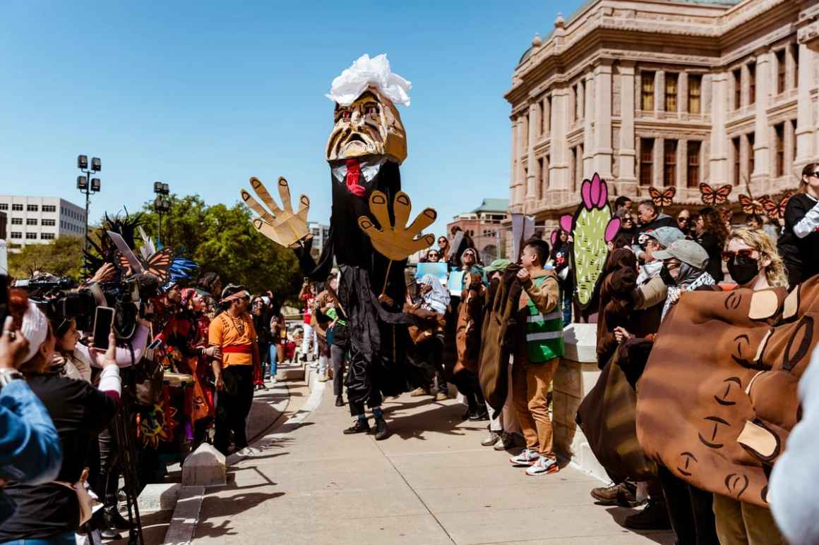 Texas politician puppet at immigrants' rights rally