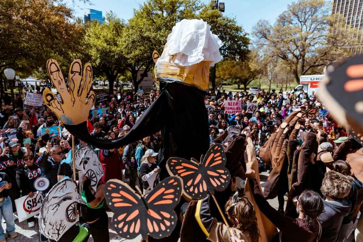 Texas politician retreats at immigrants' rights rally