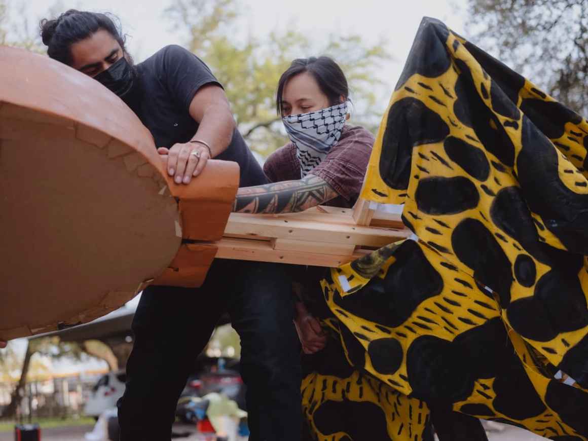 Kill Joy and Rebo create puppets for an immigrants' rights rally