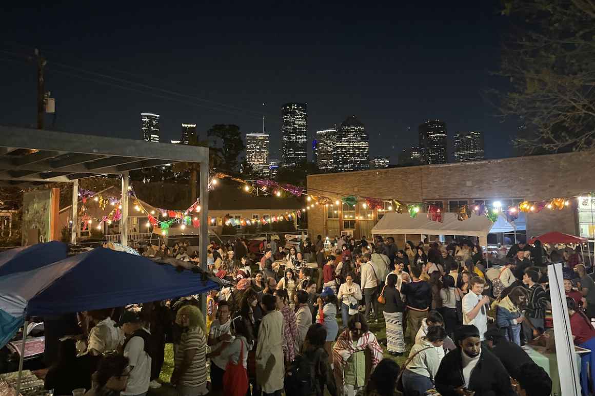 Night market during giant puppet tour stop in Houston