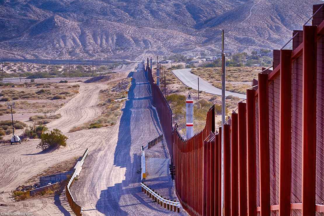 El Paso, Texas border wall between USA and Mexico running thru the desert.