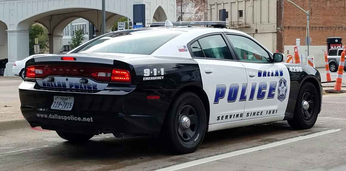 Image of a city of Dallas police squad car from the rear