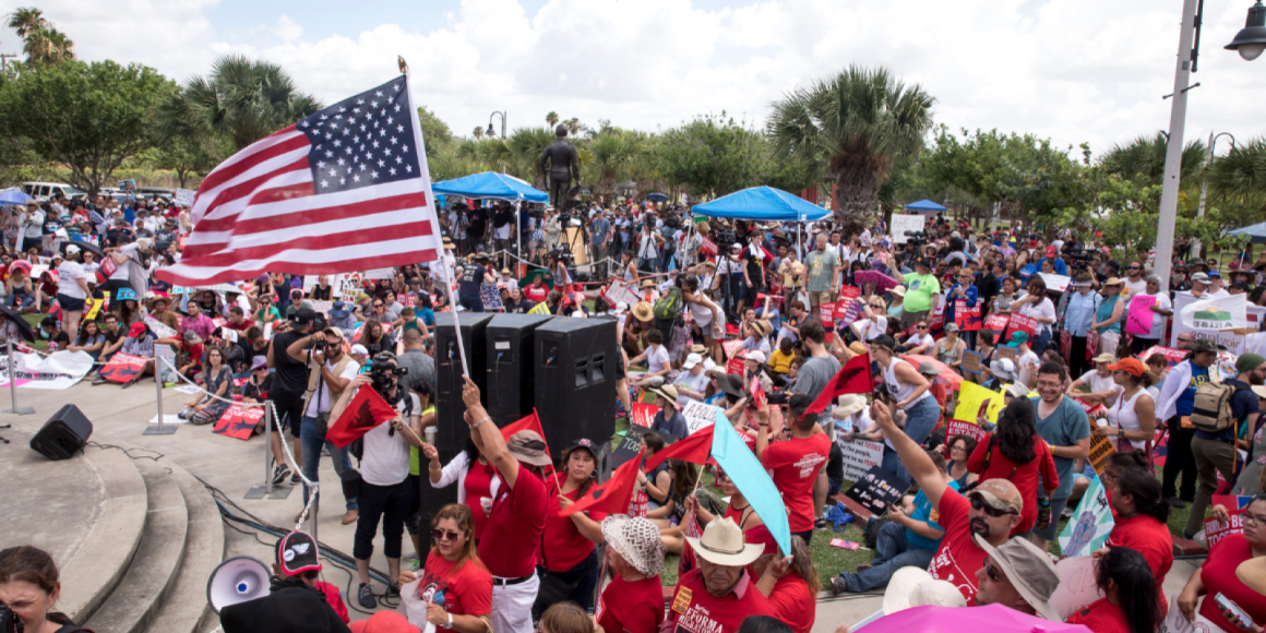 Crowd of people protesting family separation at the border