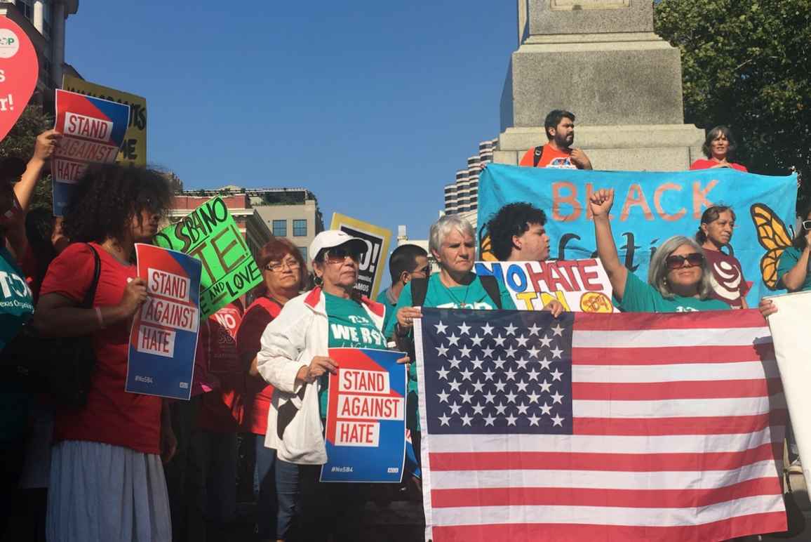 People rally outside of the Appeals court in New Orleans to block SB4