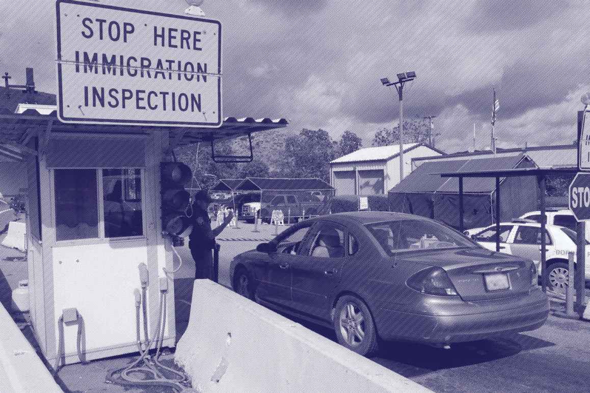 A care arrives at an immigration checkpoint within the 100-mile zone