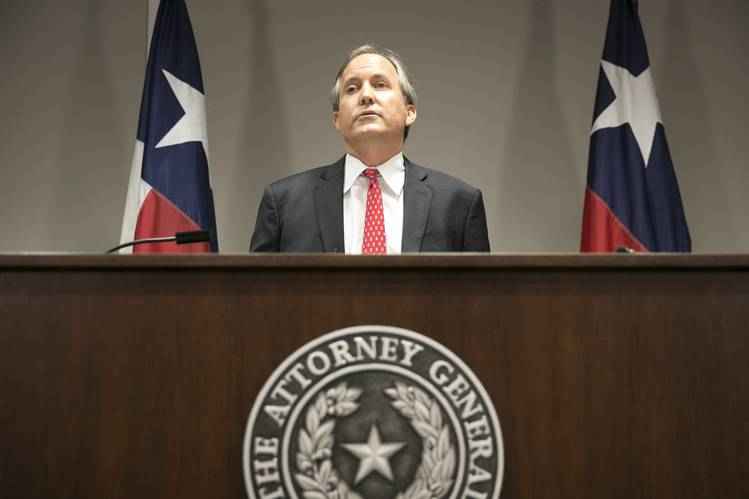 Texas attorney general Paxton at podium