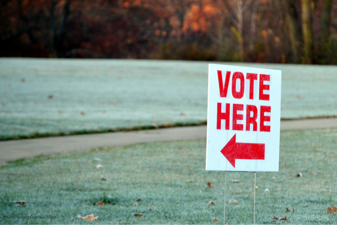 Vote here sign