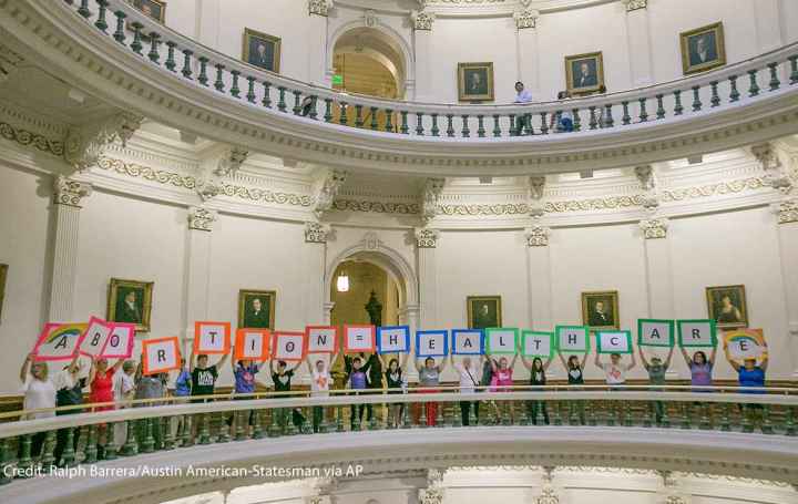 Repro + Texas Legislature Photo: Representatives of the Trust, Respect, Access Coalition, holding multicolored signs spelling out ABORTION=HEALTHCARE, gathered in the Texas Capitol Rotunda Thursday afternoon July 27, 2017 to voice their opposition to abortion legislation being...