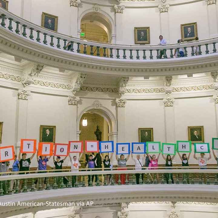 Repro + Texas Legislature Photo: Representatives of the Trust, Respect, Access Coalition, holding multicolored signs spelling out ABORTION=HEALTHCARE, gathered in the Texas Capitol Rotunda Thursday afternoon July 27, 2017 to voice their opposition to abortion legislation being...