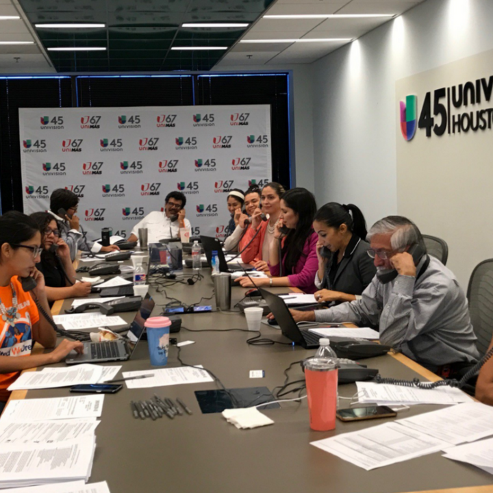 Volunteers take calls for the Immigrant Rights hotline Volunteers take calls for the Immigrant Rights hotline