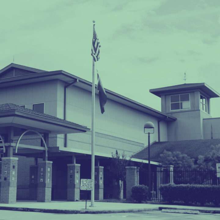 Public School Image: A stylized photo shows a school building with a flag pole in front.