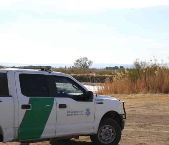 Photograph of a Customs and Border Protection truck parked on the side of the road